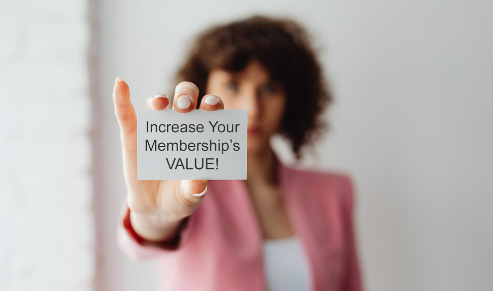 Woman showing a higher value membership card.